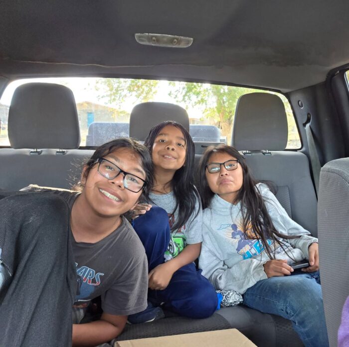 Three of Denise's grandsons in the truck